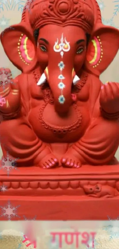 Red Ganesha statue mobile wallpaper with intricate design.