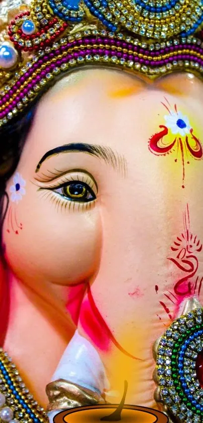 Close-up of a vibrant Ganesha statue showcasing detailed craftsmanship.