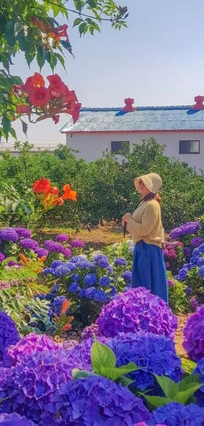 Woman in hat amidst vibrant garden flowers, featuring purple, red, and green hues.