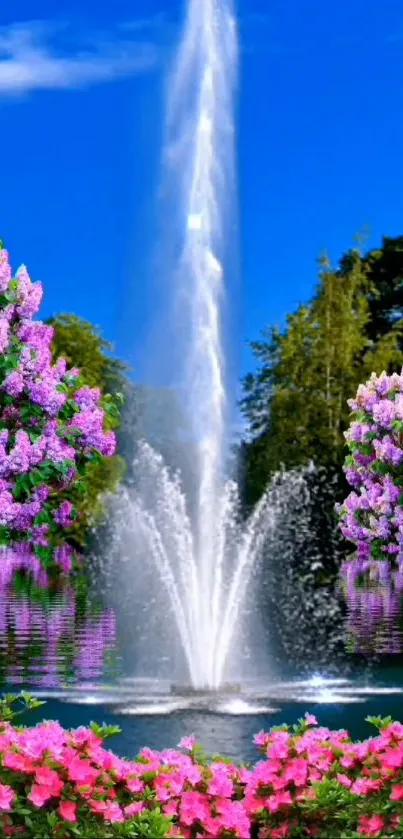 Garden fountain with flowers under blue sky.