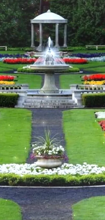 Colorful garden with fountain and vibrant flowers.