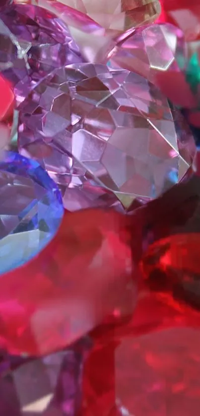 Colorful gemstones with reds, blues, and purples create a vibrant mobile wallpaper.