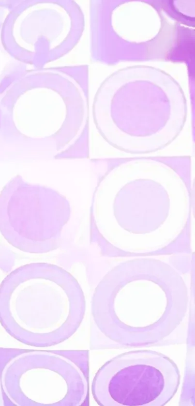 Purple geometric circles wallpaper with a modern and vibrant design.