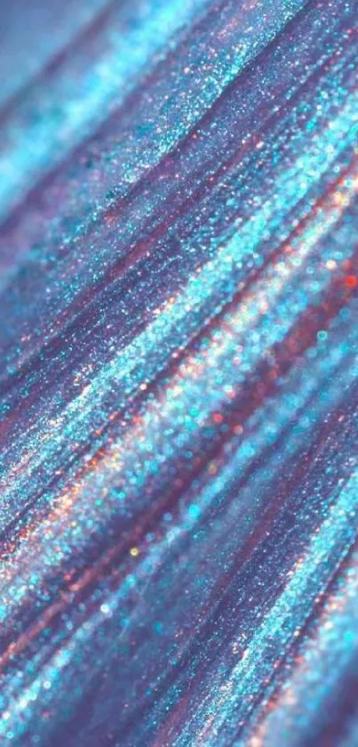 Glittery teal and pink abstract pattern wallpaper.