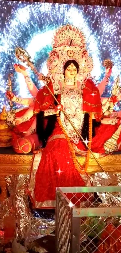 Goddess Durga in red attire with divine and vibrant background.