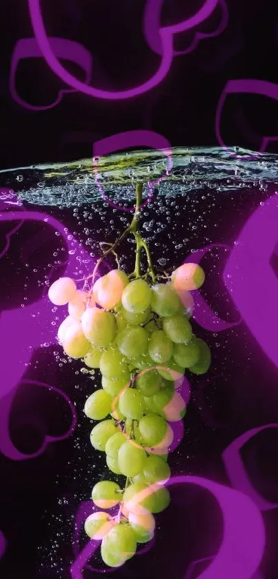 Green grapes submerged in water with vibrant pink hearts in the background.