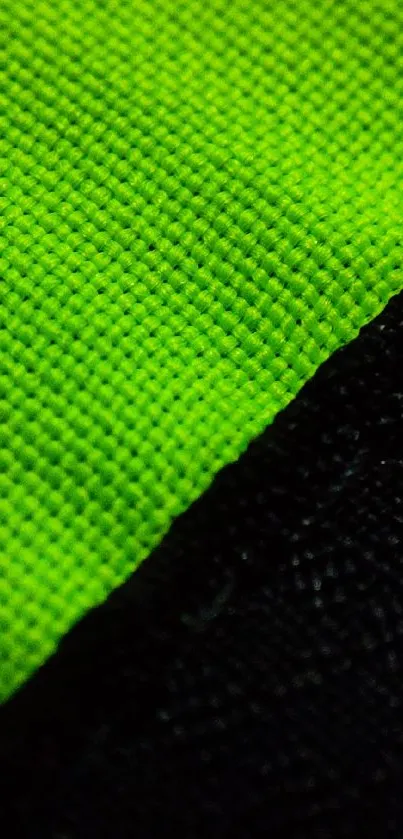 Vibrant green and black textured phone wallpaper.