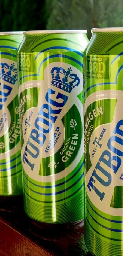 Vibrant green Tuborg beer cans in a colorful display.