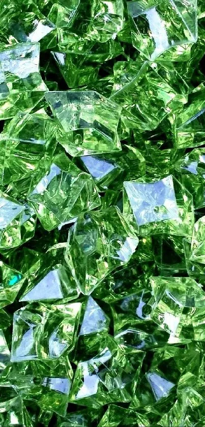 Green crystal wallpaper with vibrant texture and reflective facets.