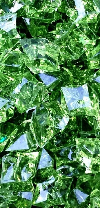 A vibrant wallpaper featuring sparkling green crystals with a shiny texture.