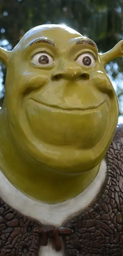 Green ogre statue in a vibrant park setting.