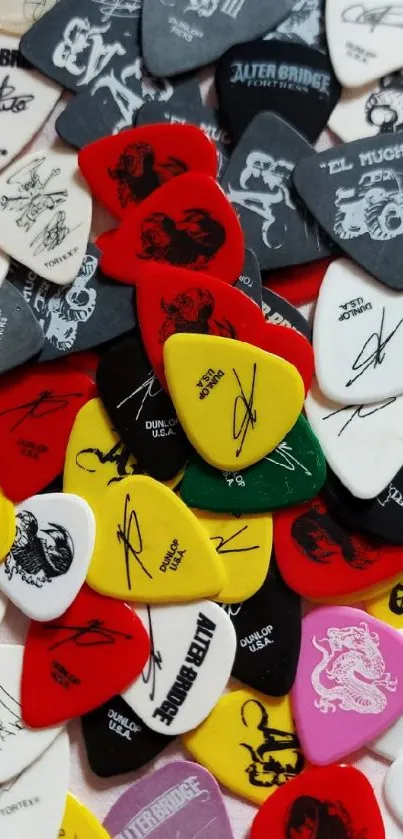 A vibrant collection of colorful guitar picks with various designs.