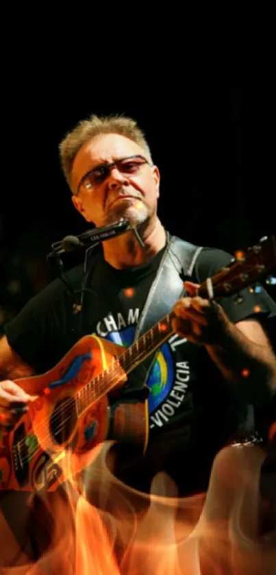 Guitarist performing live with colorful guitar on dark stage.