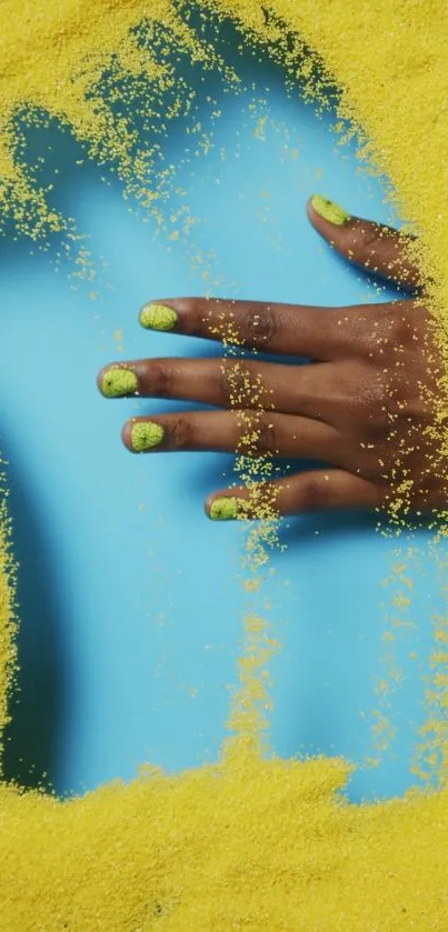 Hand with vivid nail art on a colorful background.