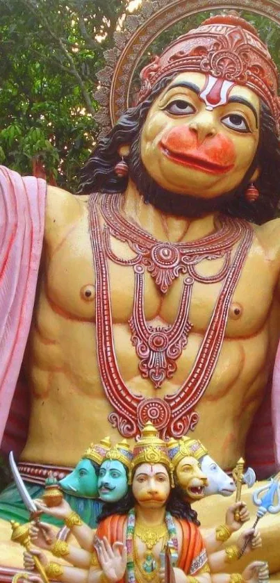 Colorful Hanuman statue mobile wallpaper with intricate details and vivid colors.