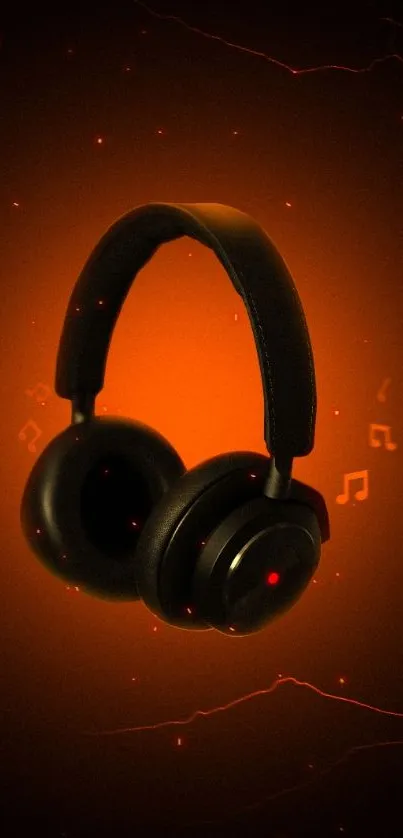 Orange glowing headphones wallpaper with music theme.