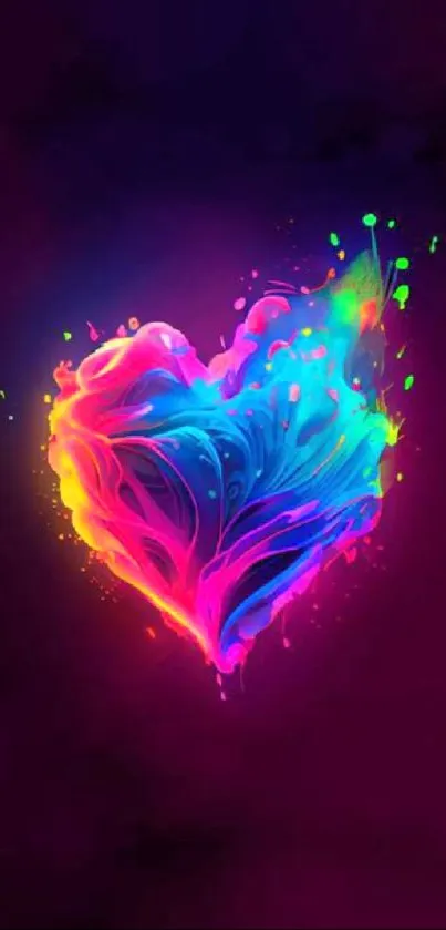 Colorful heart-shaped neon paint splash on a dark background.