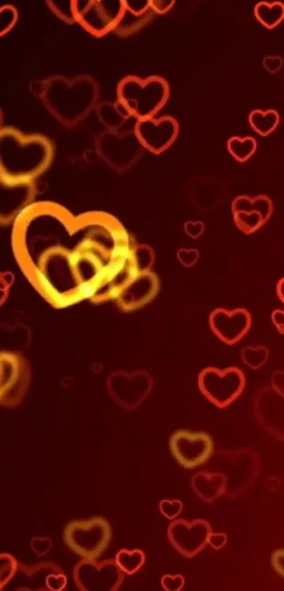 Vibrant red and orange heart bokeh wallpaper with glowing effects.