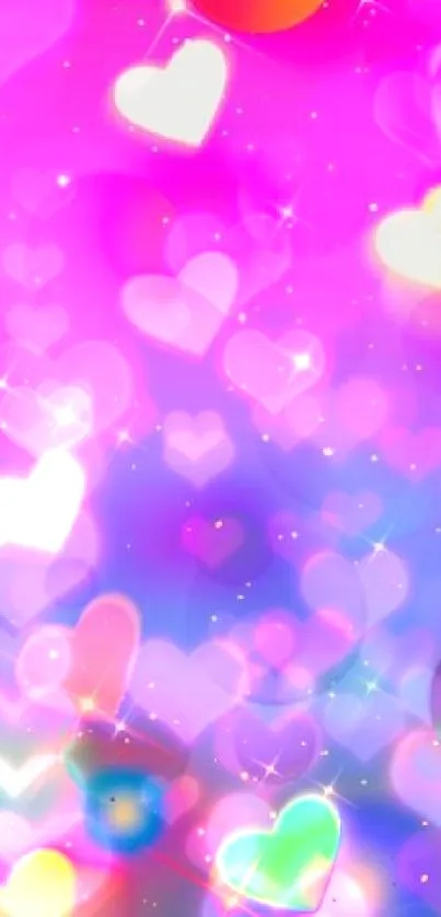 Vibrant heart bokeh wallpaper with pink and rainbow colors.