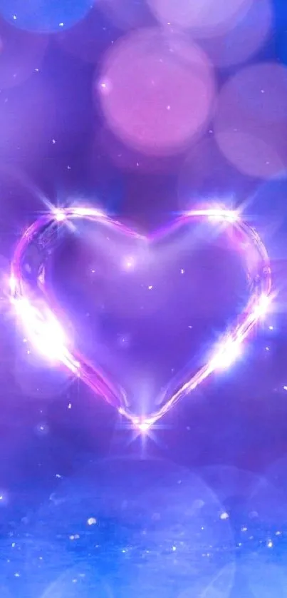 Vibrant heart bokeh wallpaper with purple and blue hues.