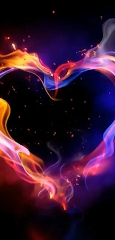 Colorful heart flame on dark background wallpaper.