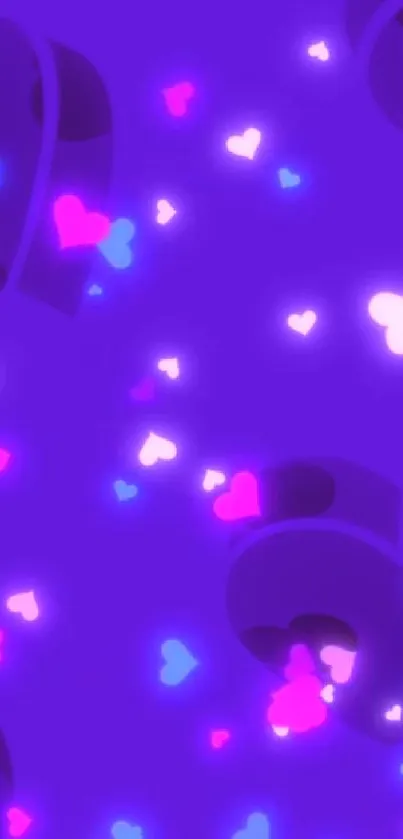 Vibrant purple wallpaper with glowing heart shapes.