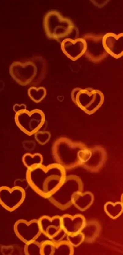 Vibrant orange heart glow wallpaper for mobile.