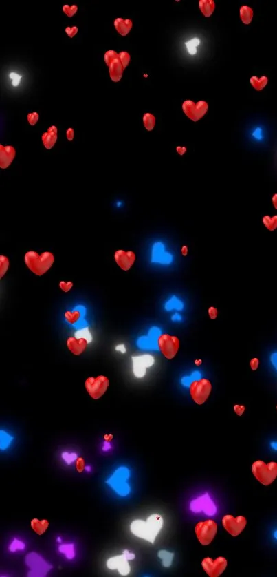 Colorful glowing hearts on a black background.