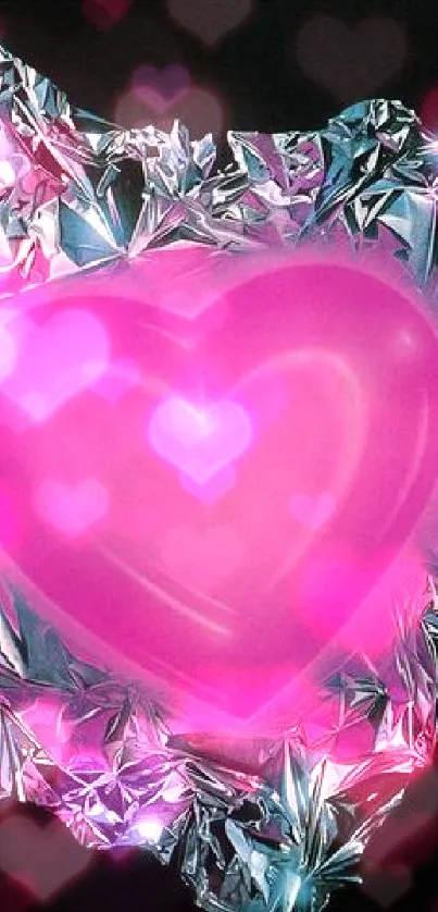 Pink heart on metallic foil against a dark background.