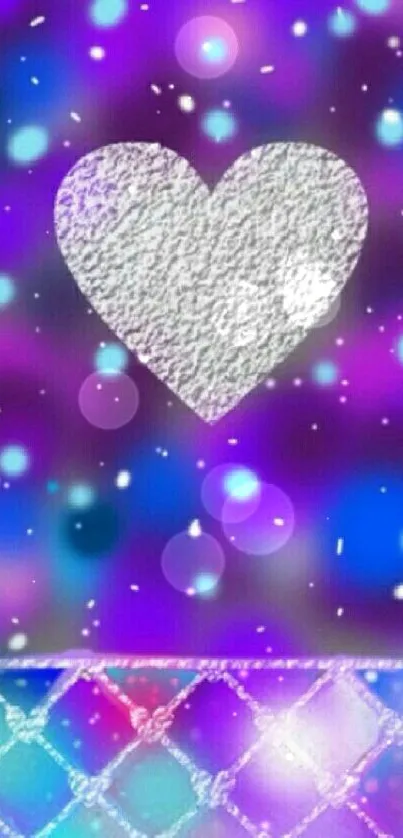 Vibrant purple and blue wallpaper with a textured silver heart.