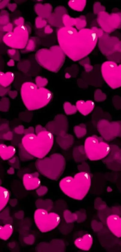 Vibrant mobile wallpaper with pink hearts on a dark background.