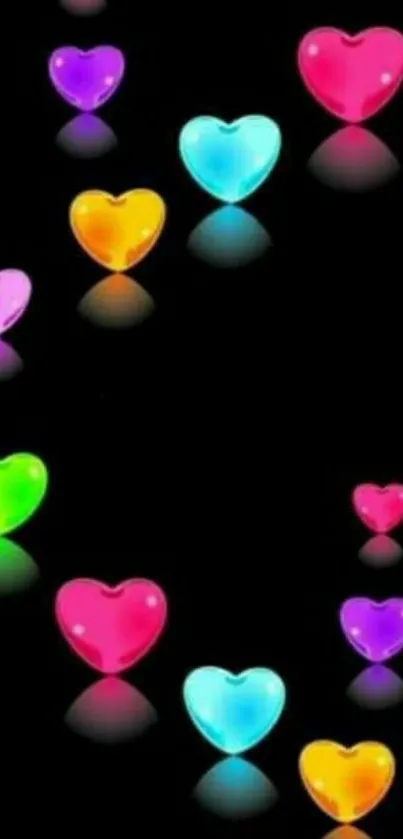 Colorful neon heart wallpaper on black background.