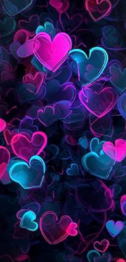 Neon hearts wallpaper with dark background, pink and blue colors.