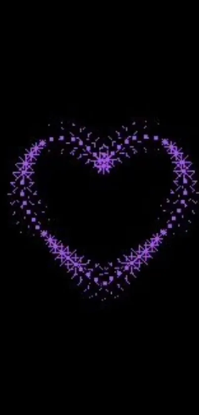 Purple neon heart on black background wallpaper.