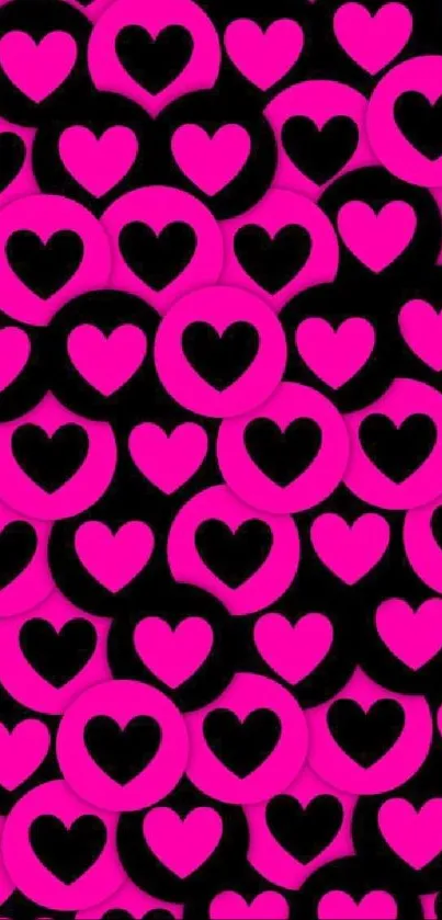 Vibrant pink and black heart pattern wallpaper.