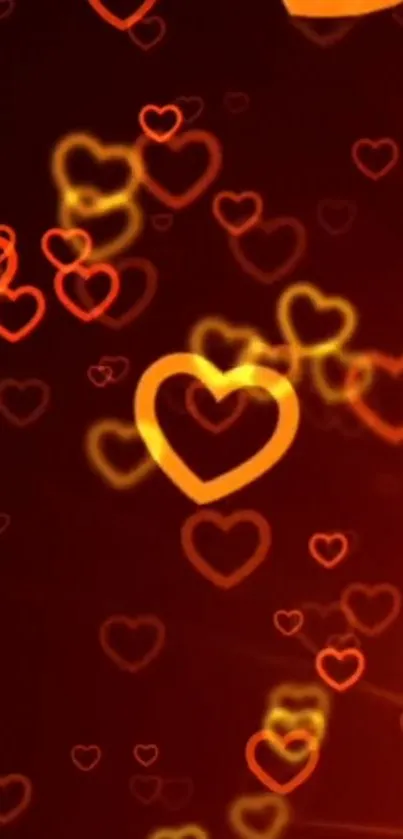 Glowing hearts wallpaper with orange and red shades on a dark red background.