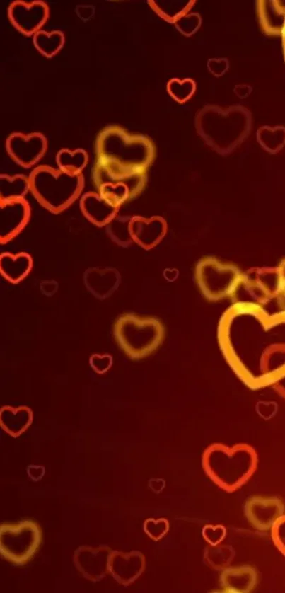 Mobile wallpaper with glowing red and orange heart pattern.