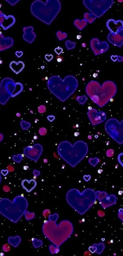 Vibrant glowing hearts on a black wallpaper.