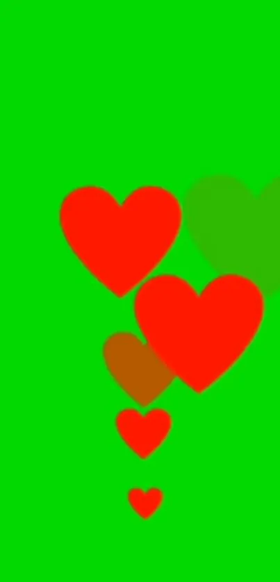 Mobile wallpaper with red hearts on a green background.