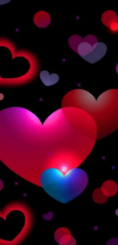 Vibrant pink and red heart pattern wallpaper with glowing effects.