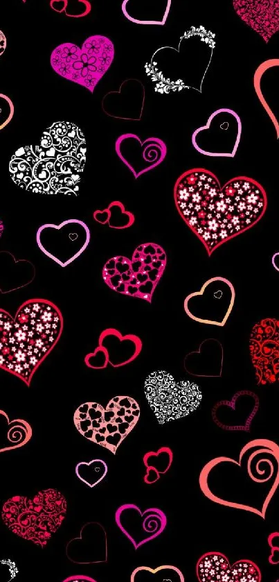 Colorful heart pattern with black background wallpaper.