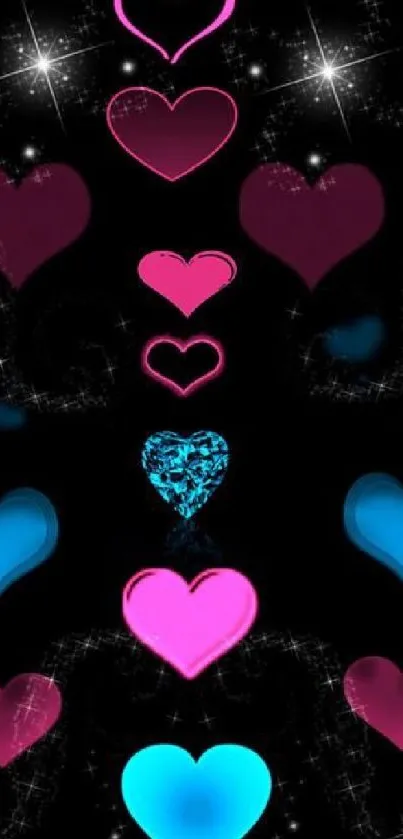 Vibrant pink and blue hearts wallpaper on a dark background.