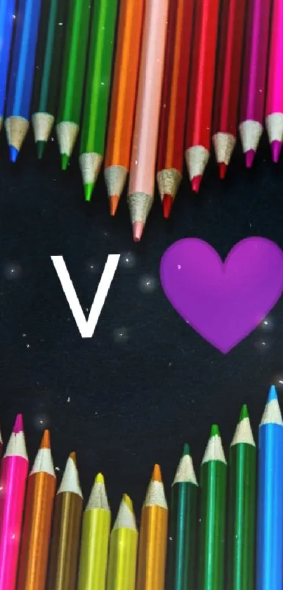 Colorful pencils forming a heart with a 'V' on black background wallpaper.