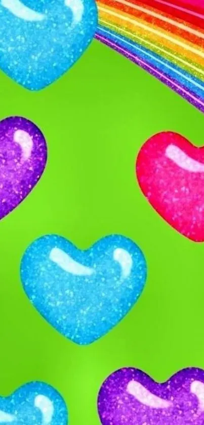 Vibrant glitter hearts with rainbow on green background.