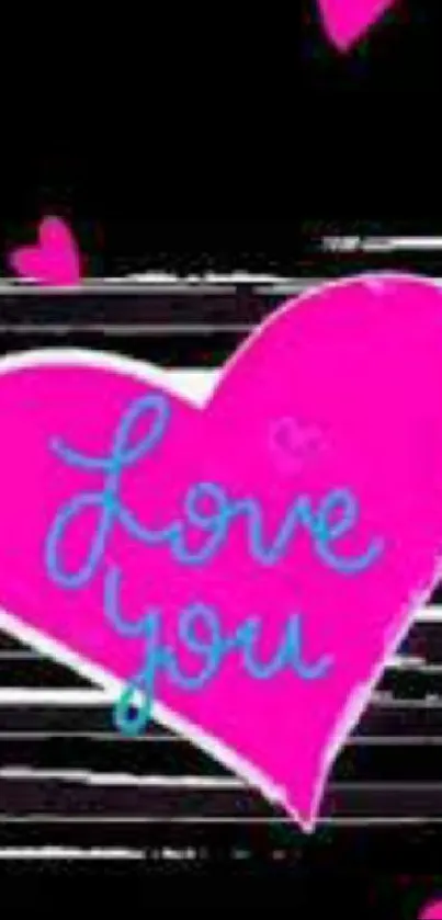 Pink heart with love text on striped wallpaper.