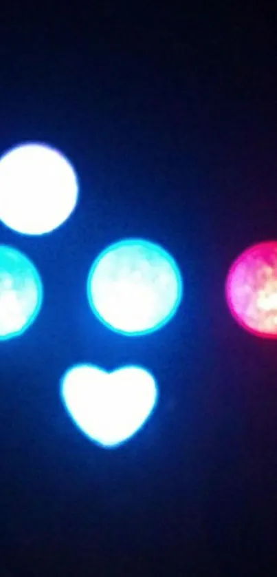 Colorful LED lights in heart and circle shapes on a dark background.