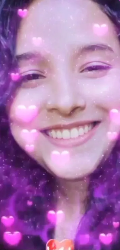 A smiling face surrounded by pink and purple hearts.