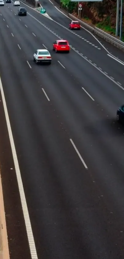 Vibrant highway scene with cars on road.