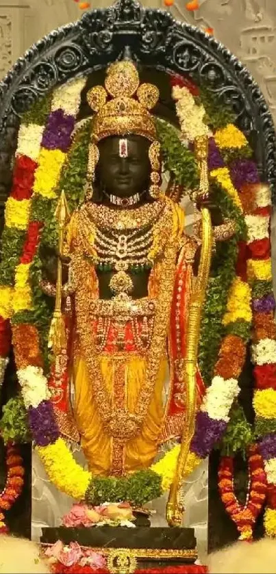 Intricate Hindu deity adorned in colorful garlands.