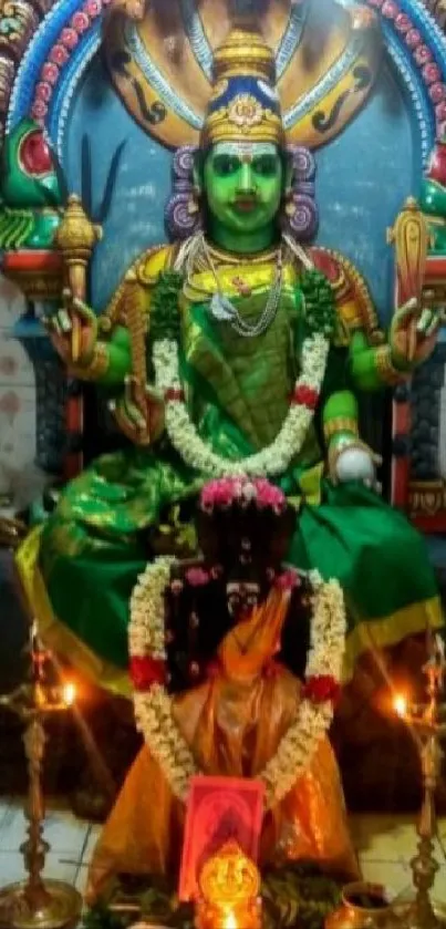 Vibrant Hindu deity shrine with intricate decorations and rich colors.